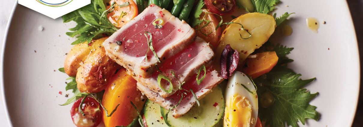 A dish has a variety of vegetables and spices from UCLA's BPlate.