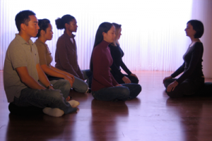 Students meditating at the mindfulness awareness research center