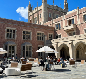 students sitting outside of ucla kerckhoff hall