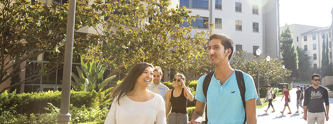 ucla students walking next to De Neve Plaza