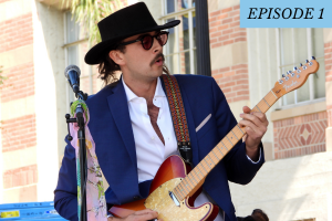 Episode 1 featured photo: A man playing the guitar