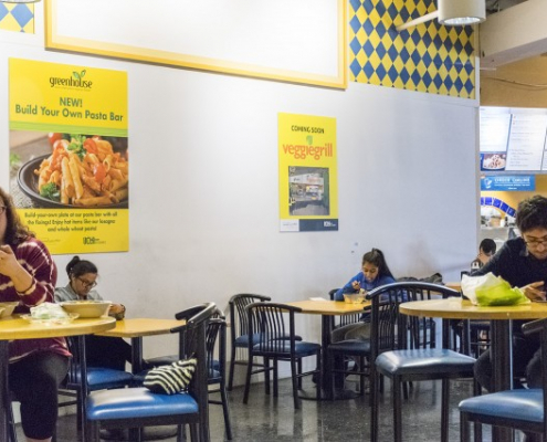 People eating at the cafeteria