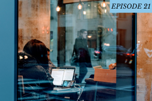 Episode 21 featured image: a woman studies and video calls another person in a cafe.