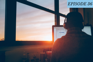 Episode 36 featured image: a man has his headphones on as he works on his computer