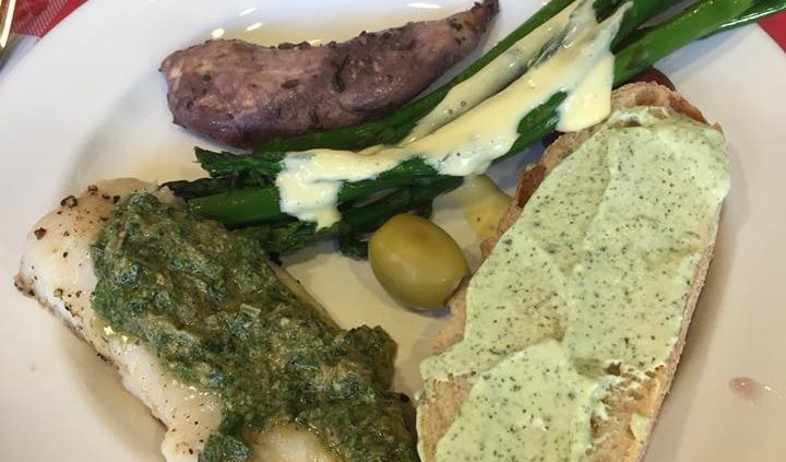 Another dish with fish, carbs and assorted vegetables.