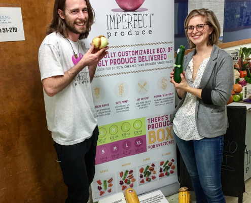 woman and man posing for a photo