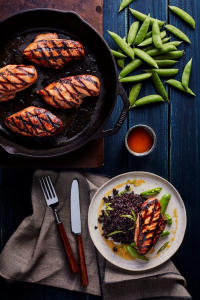 A freshly prepared dinner with seared protein, grains and vegetables.