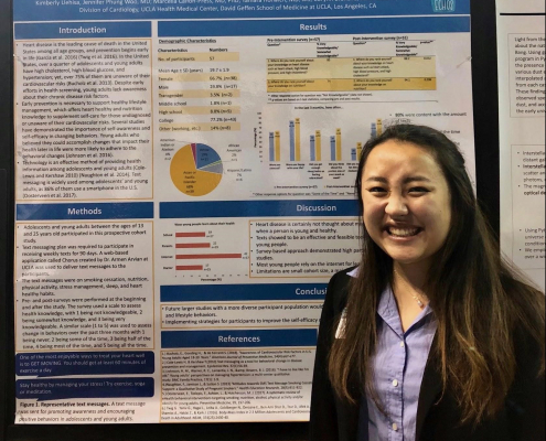 Woman presenting her research at a conference