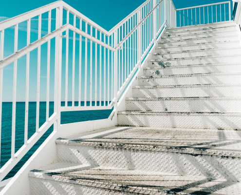 Stairs leading up from the ocean.