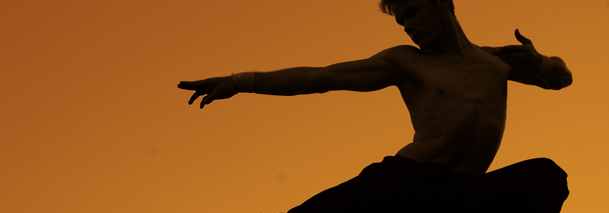 A man practices martial arts.