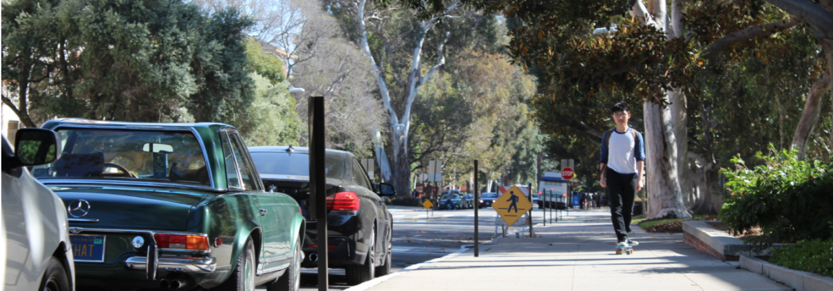 A student walks down the street.