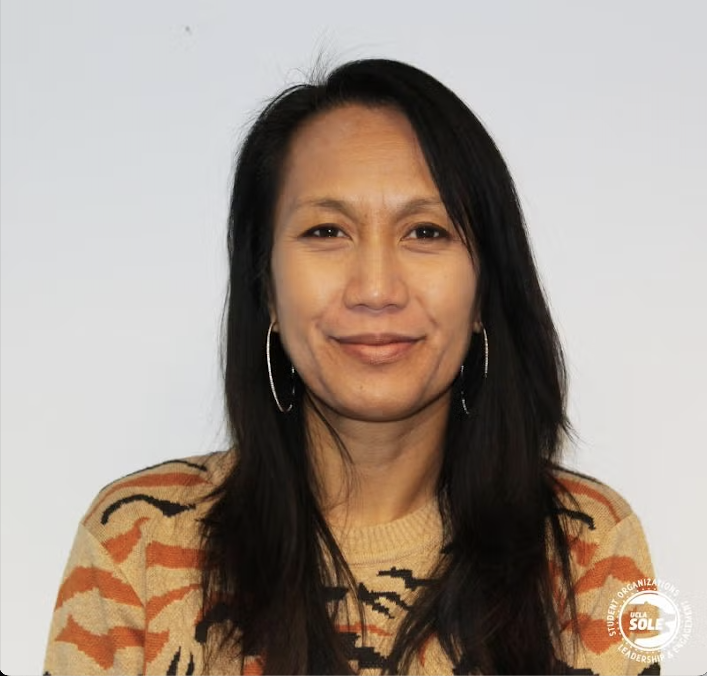 Melissa Veluz-Abraham Headshot